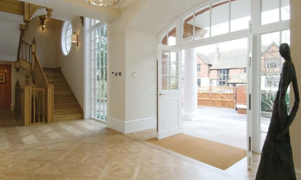 Internal view showng the high quality joinery of the wooden windows, doors and staircase built by Gowercroft