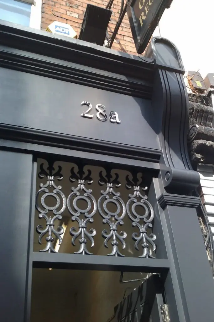 Listed shop front replacement black painted