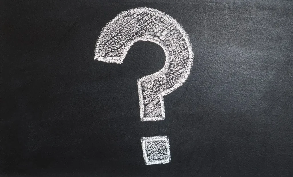 Question mark on chalk board