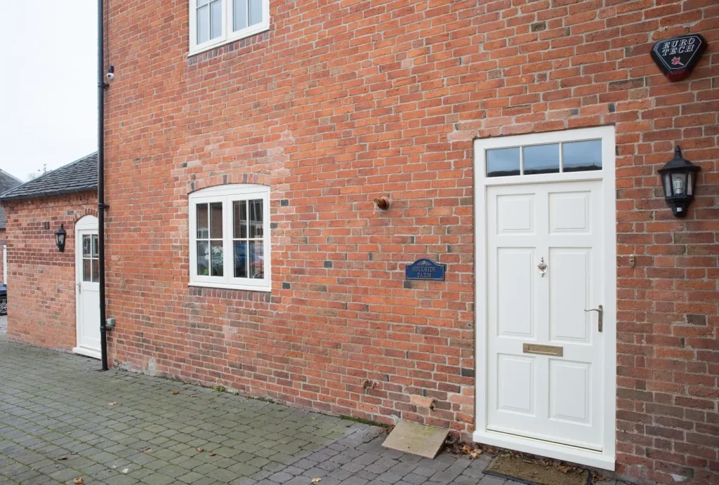 6 panel single Melbourne door all timber panels top fan light painted off white Hardwick casement window radial top scribe cottage style