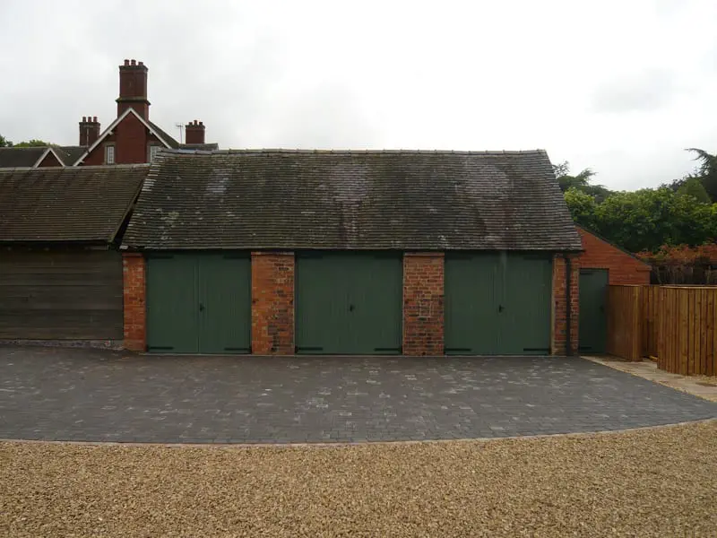 Hardwood garage doors painted booth barn conversion brick