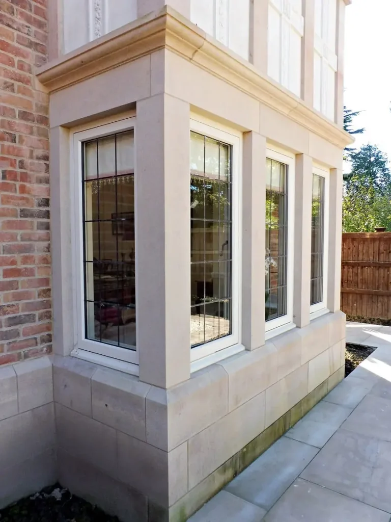 Hardwick casement akoya windows stone mullions square lead glass painted strutt yellow square bay 2 two storey