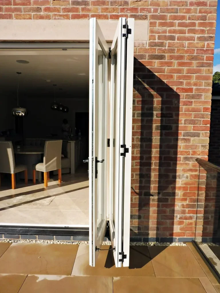 Tutbury bifold door 3 three panel painted strutt yellow clear glass fully open folded back