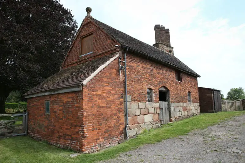 View of Colliers Oak Farm Barn showing heritage windows