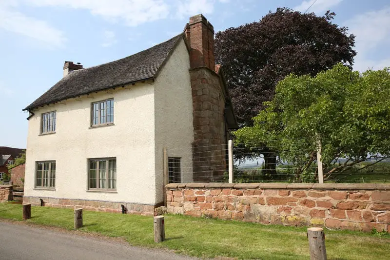 Front view of the farm house and Colliers Oak Farm from Filongley road with more detail on the wooden windows