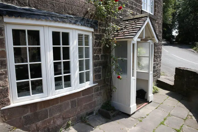 The porch and bay part of the heritage window installation at the Smithy, Whatstandwell