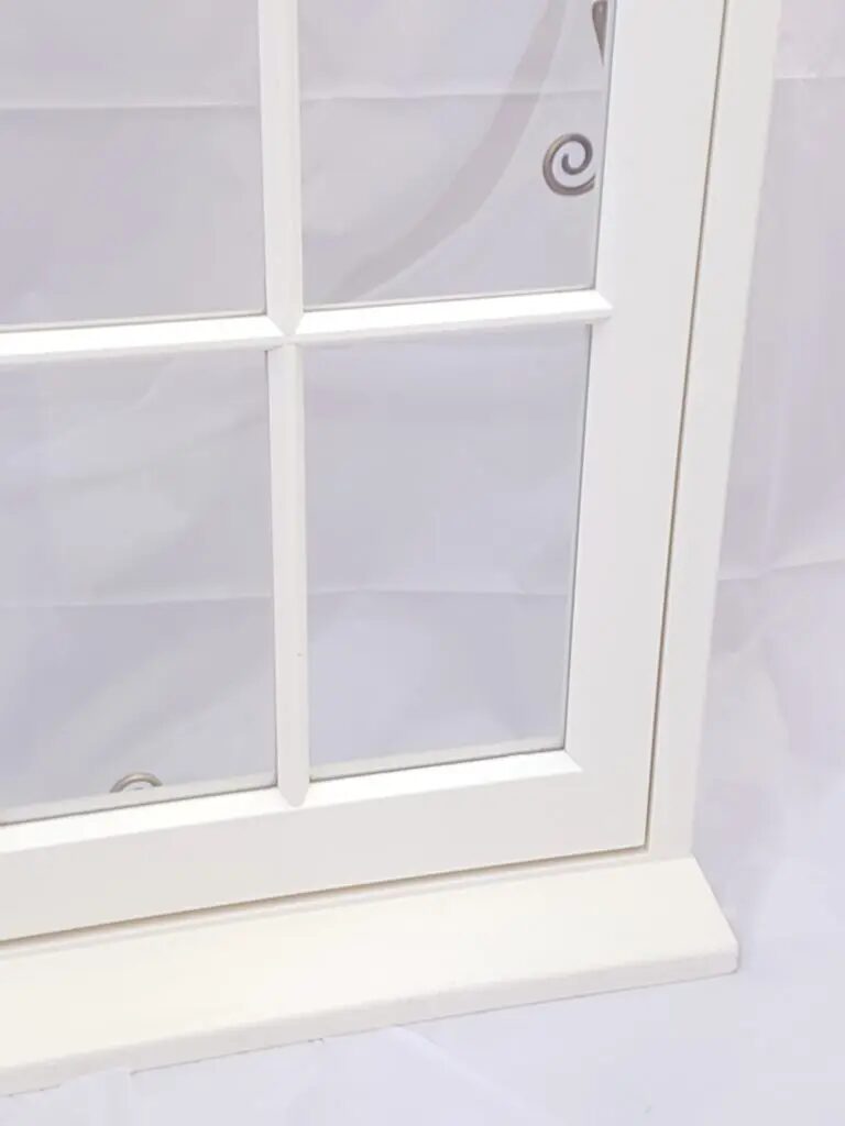 Close up of astragals on SpaciaTM vacuum double glazing a perfect replacement window in a conservation area