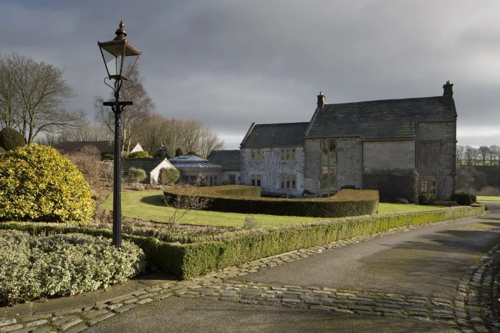 A listed building in a conservation area where replacement windows must be approved by the local planning authority