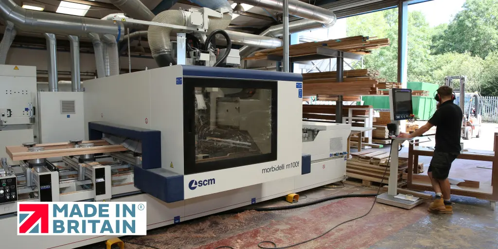 Made in Britain logo superimposed over a photo of a CNC router window making machine in the Gowercroft factory