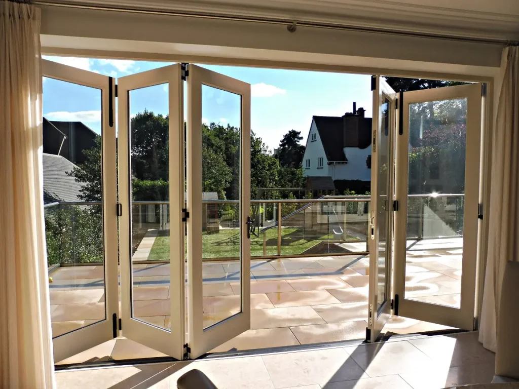 bifold door opening up a room to a large patio area