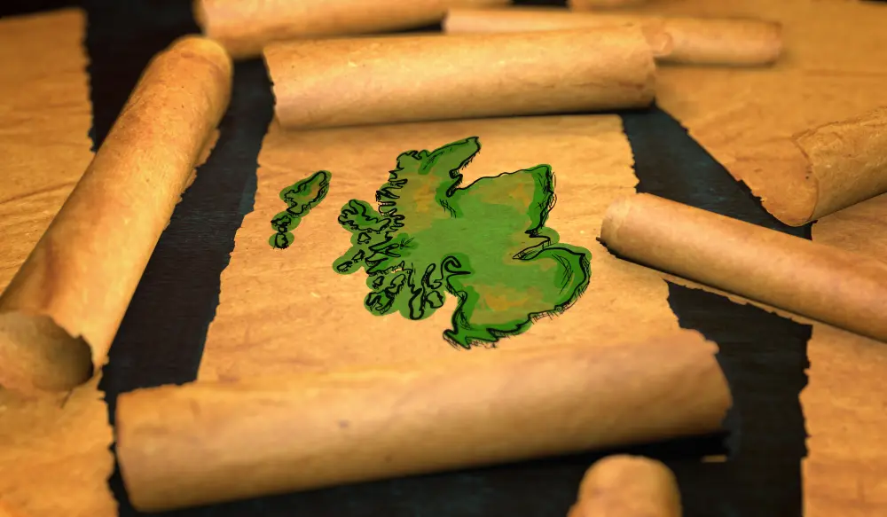 Illustration of a green map of Scotland painted on aged parchment, surrounded by partially unrolled scrolls, representing Scottish heritage and traditional architecture.
