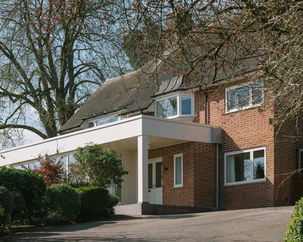 Arwel House, Staffordshire: closer shot of the new lift and slide doors from the front elevation