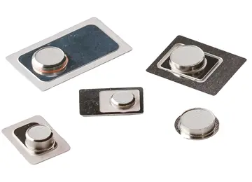 A selection of vacuum glazing getters in various shapes and sizes, designed to absorb residual gases and maintain the vacuum seal within insulated glass units.