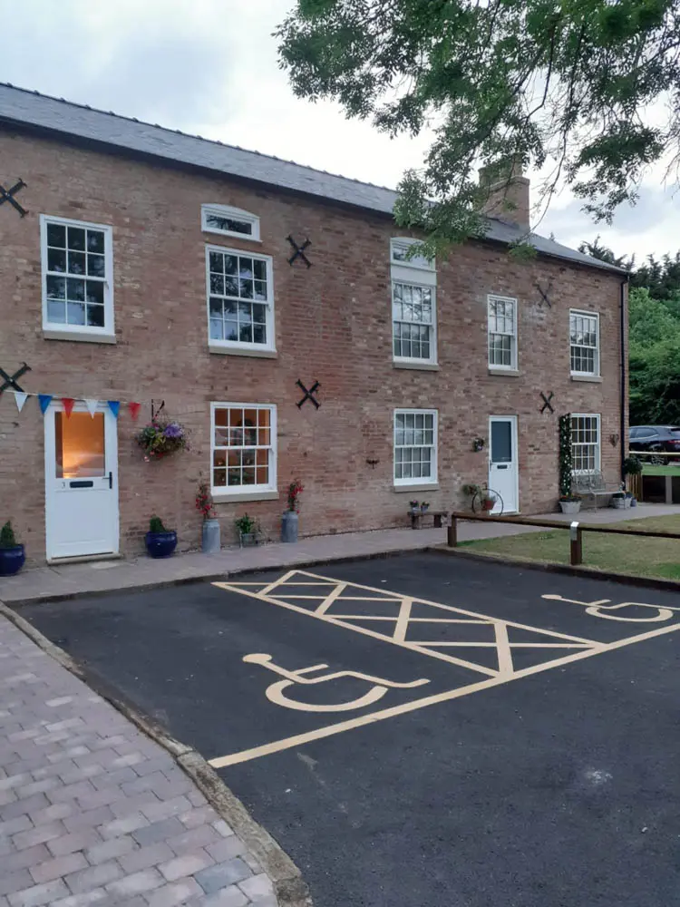 Canal Side Cottages: long shot from the front showing sash windows