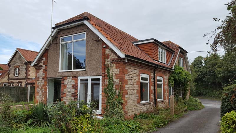 modern comfort and historic aesthetics in Keystone Architecture's latest village residence