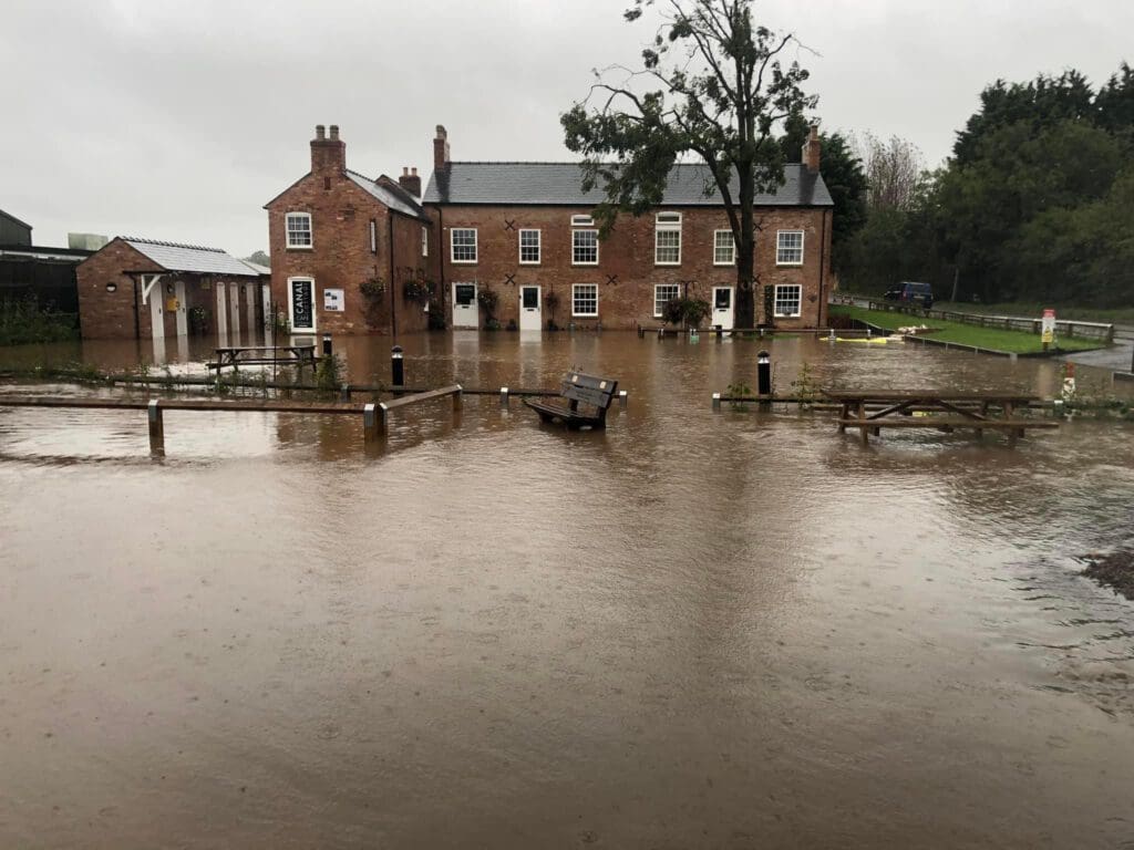 Derby and Sandiacre Canal Cottages and Cafe during a flood.