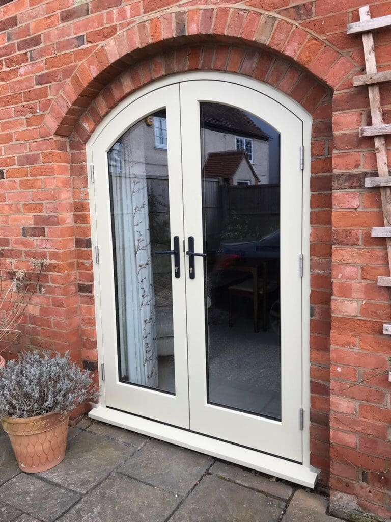 Melbourne curved top doors