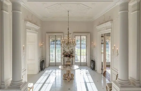 One of the many guest bedrooms at Templeton House in London with the large sash windows made by Gowercroft